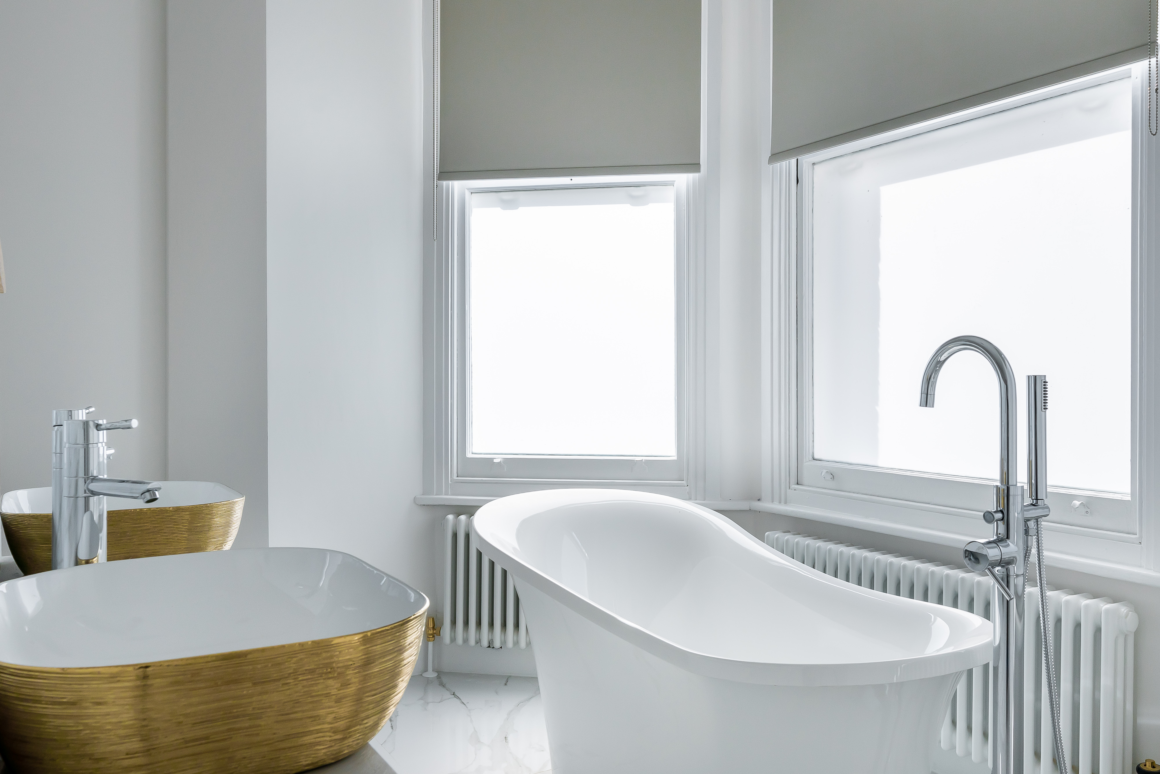 Bathrooms project photo 2 by Hozea Construction in North London