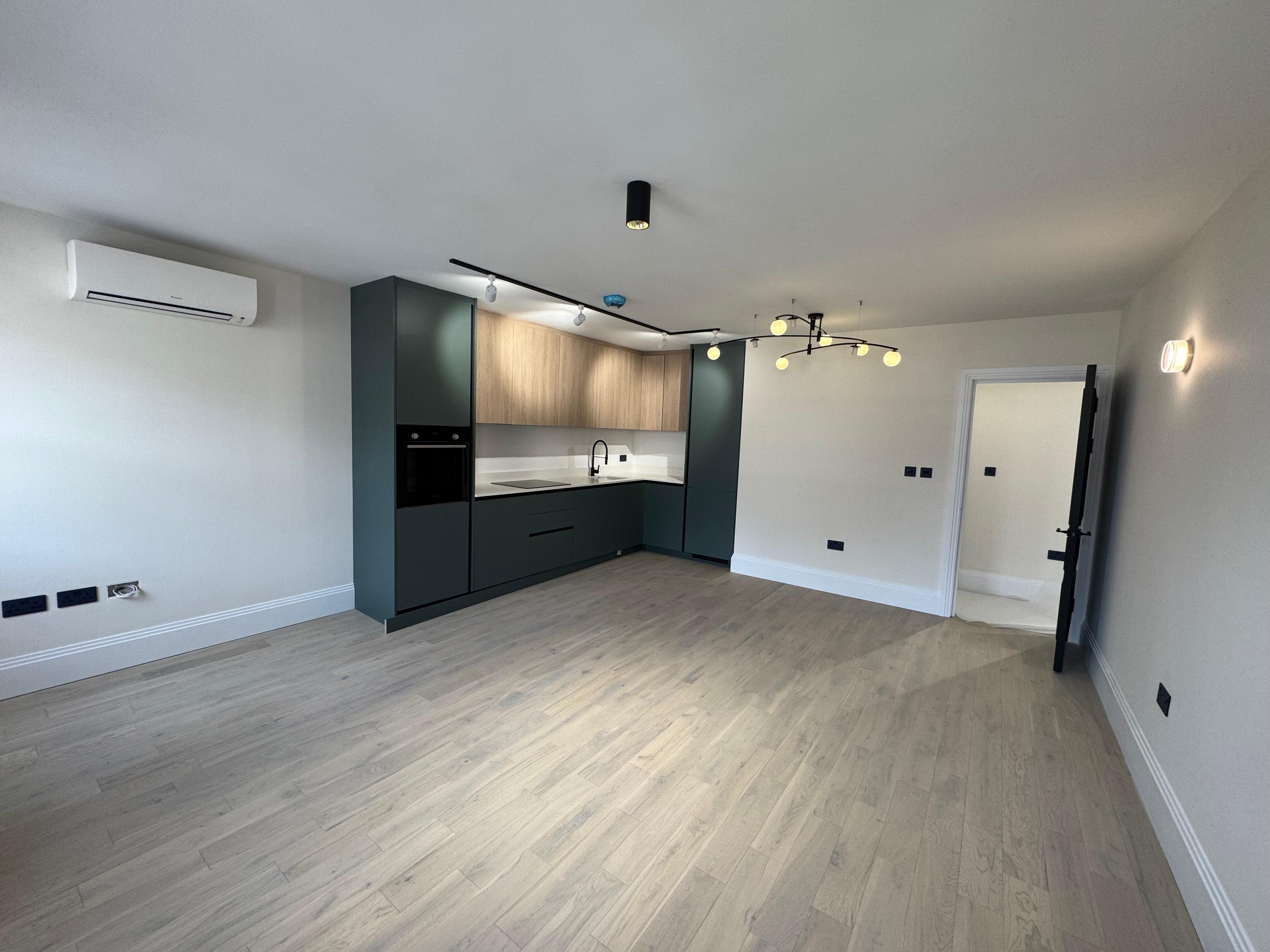 Flooring and tiling project photo 6 by Hozea Construction in North London